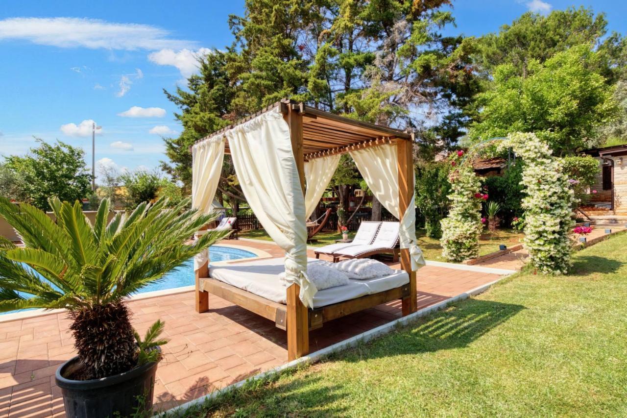 Holiday Home Giardino Marino Pomer Exterior photo